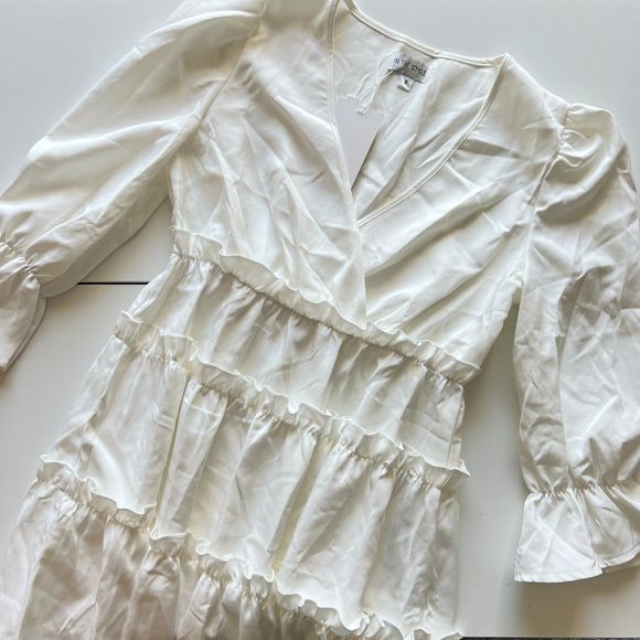 In The Style x Billie Faiers wrap over flutter sleeve tiered mini dress in white - Picture 5 of 7